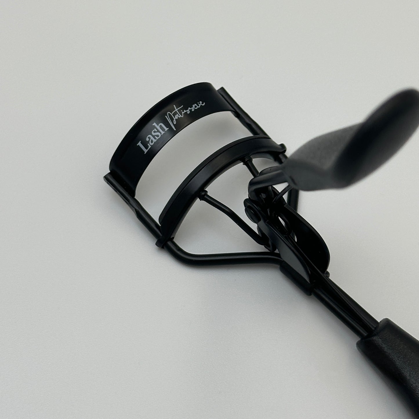 Eyelash Curler.